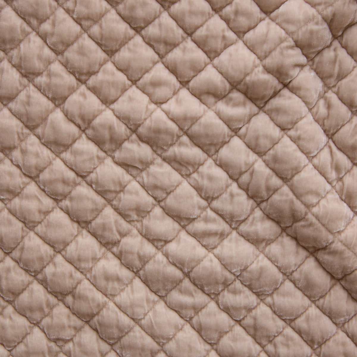 Close-up of Pearl silk velvet quilted coverlet showing diamond stitching pattern.