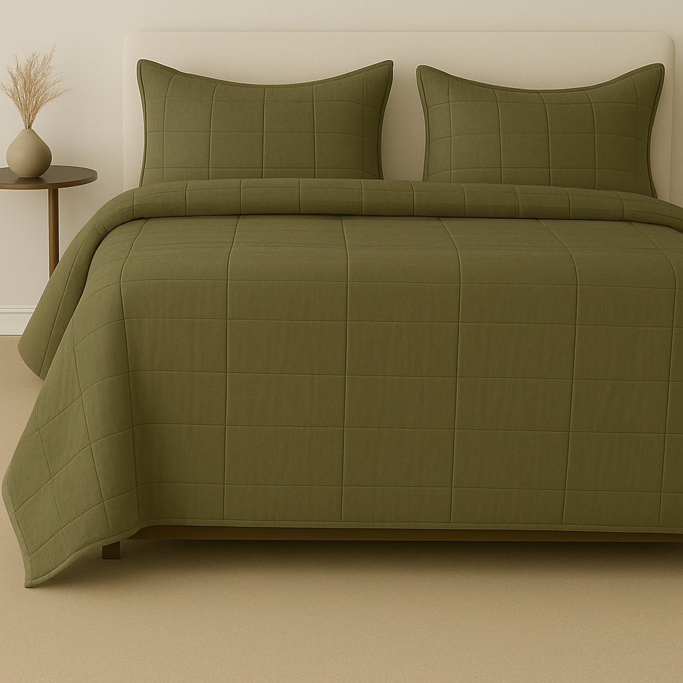 Olive Ann Gish Slub Tencel coverlet set styled on a bed with matching shams.