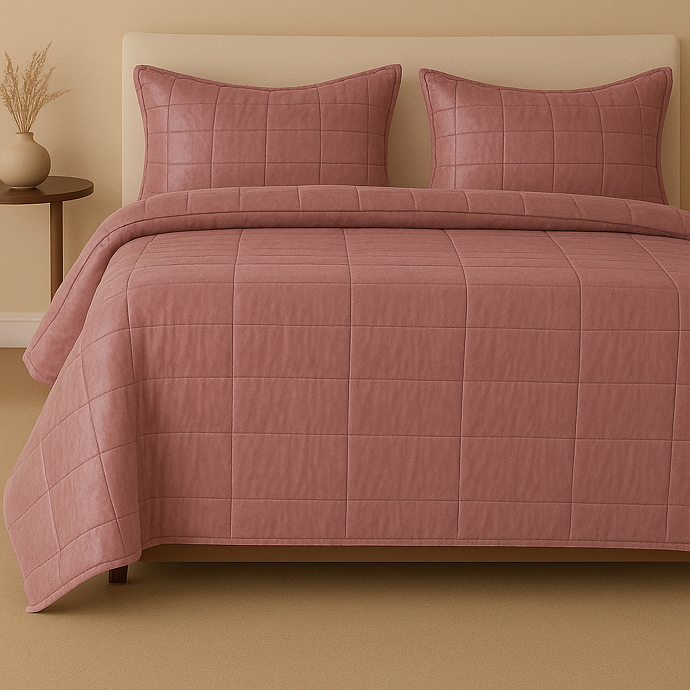Ann Gish Slub Tencel coverlet set in dusty rose, grid-stitched quilting on styled bed.