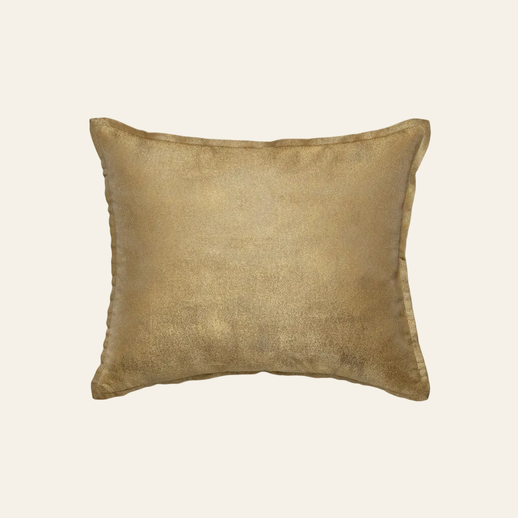 Ann Gish Stardust pillow in gold with subtle metallic texture and flange trim.