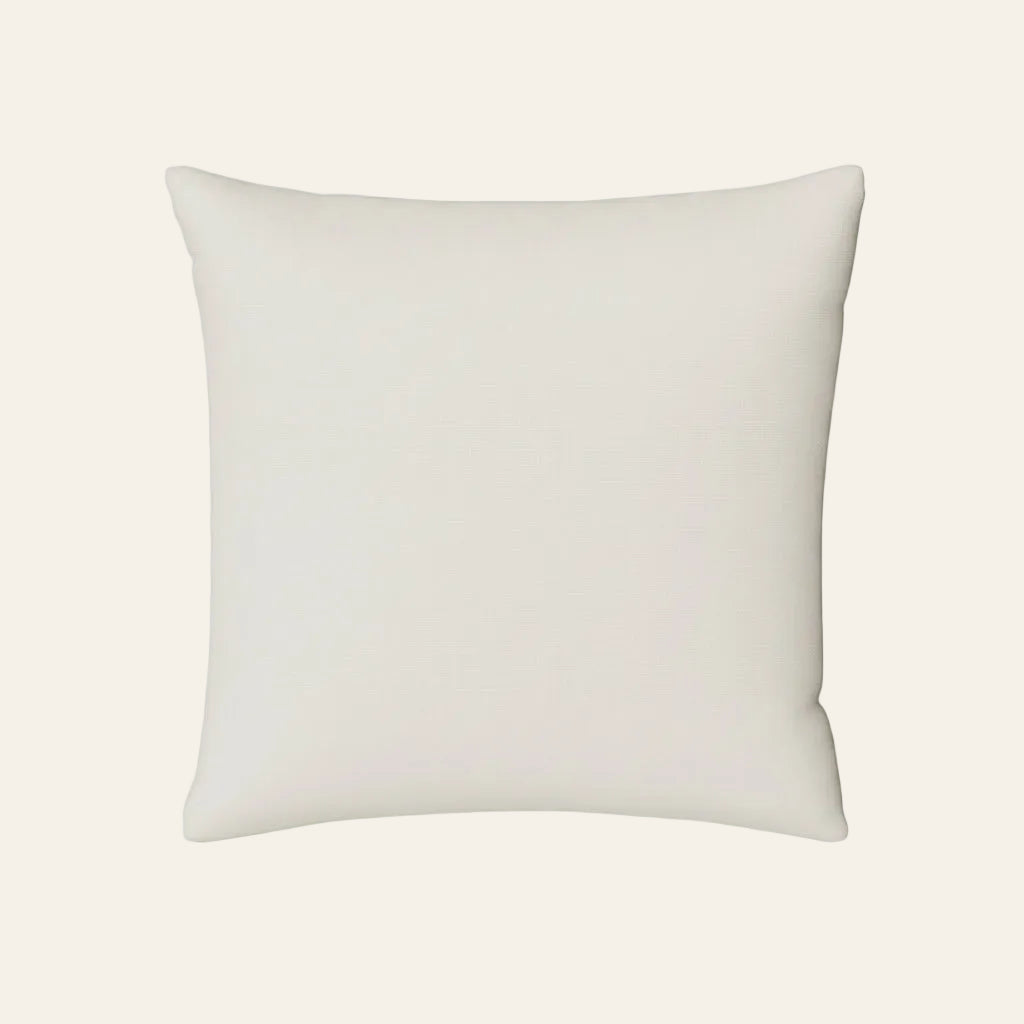 Ann Gish Strata euro sham in ivory, smooth fabric with subtle woven texture, square silhouette.