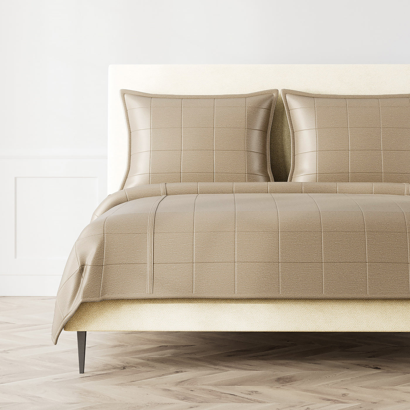 Ann Gish Stria quilted coverlet in taupe with grid-stitched pattern on styled bed.