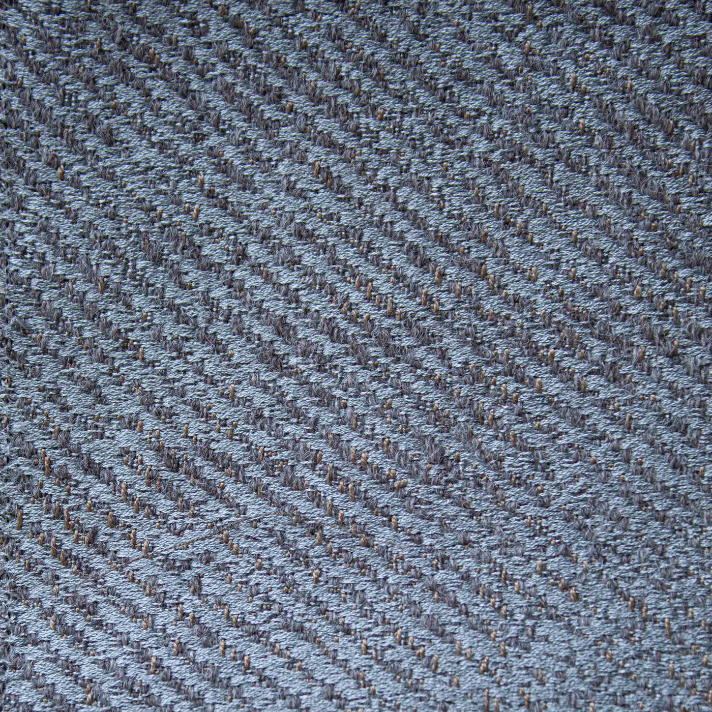 Close-up of Ann Gish Chino slate blue herringbone woven texture.
