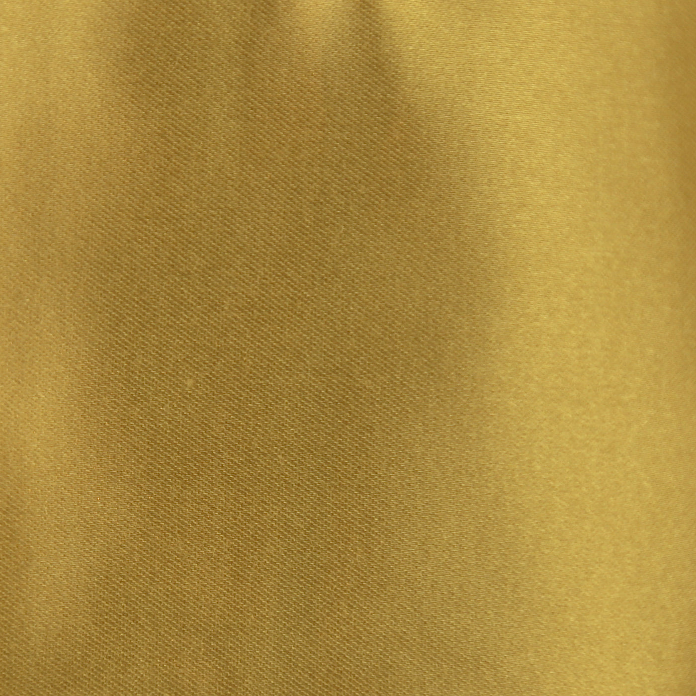 Close-up of Ann Gish Duchess pillow fabric in gold satin weave, showing subtle sheen and drape.