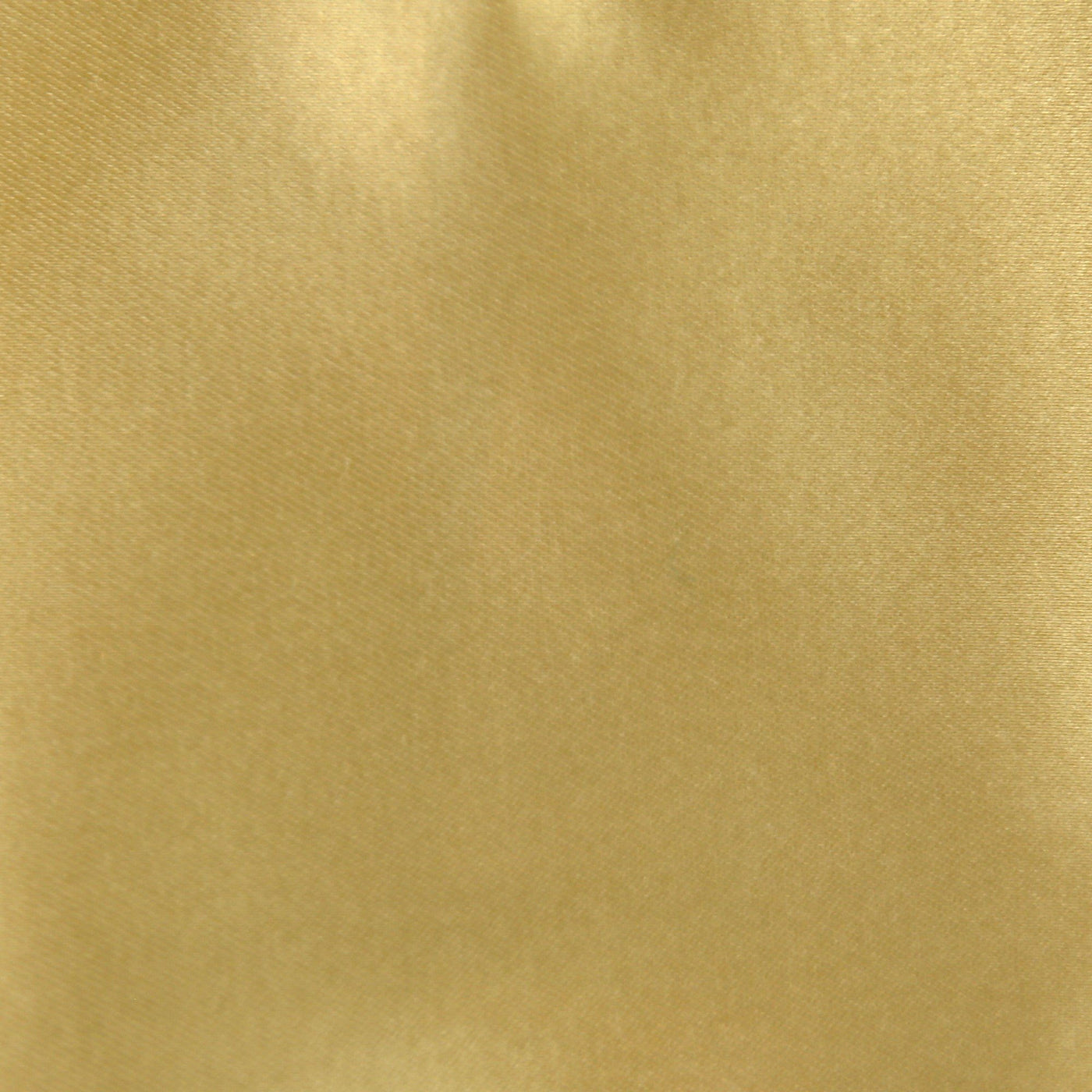 Close-up of champagne satin weave fabric with subtle diagonal texture and soft sheen.