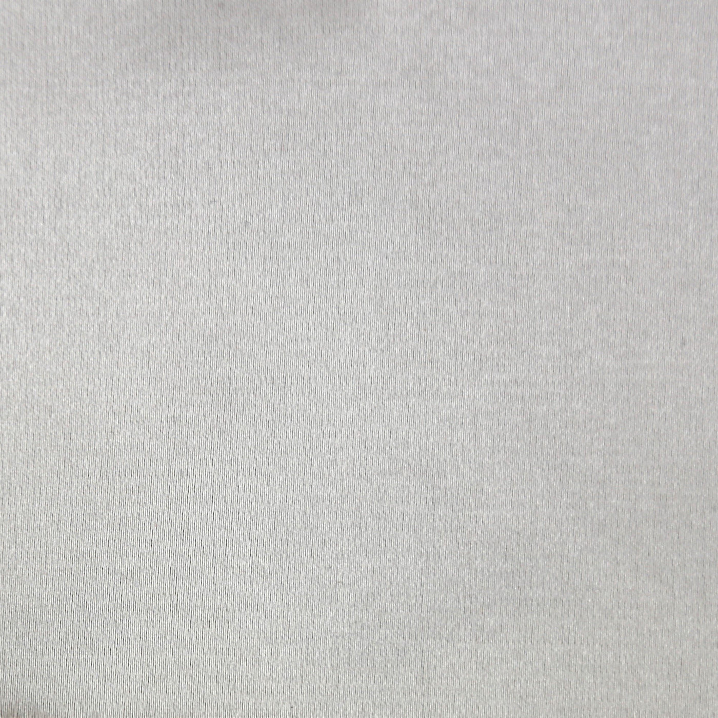 Close-up of Ann Gish Duchess pillow fabric in ivory, showing subtle woven texture.