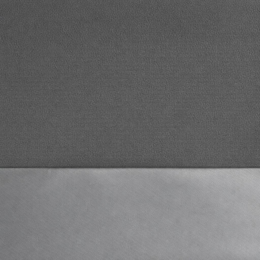 Close-up of Ann Gish Duchess reversible velvet pillow showing charcoal and silver grey contrast.