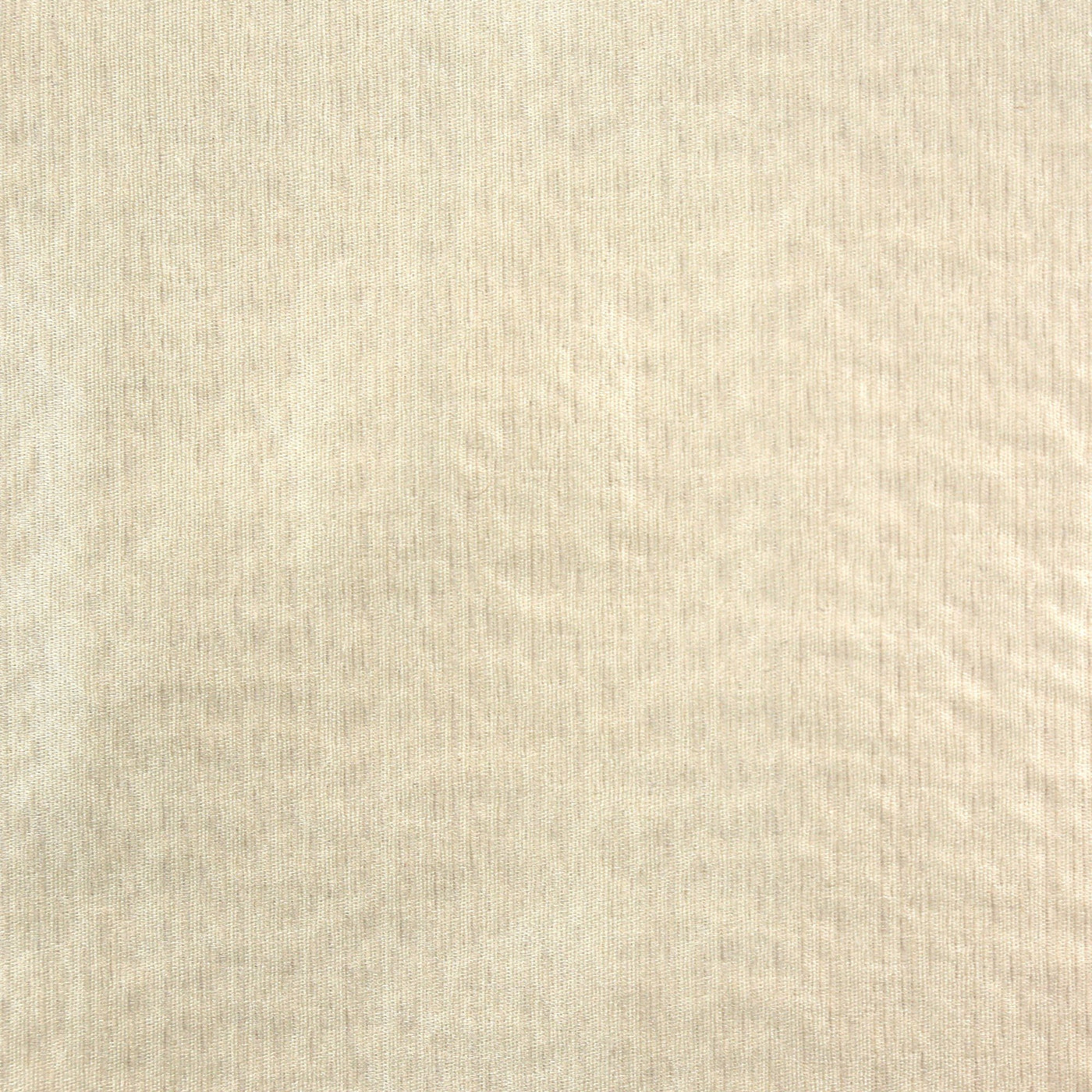 Close-up of Ann Gish Hammered fabric in ivory, showing subtle ribbed texture and soft sheen.