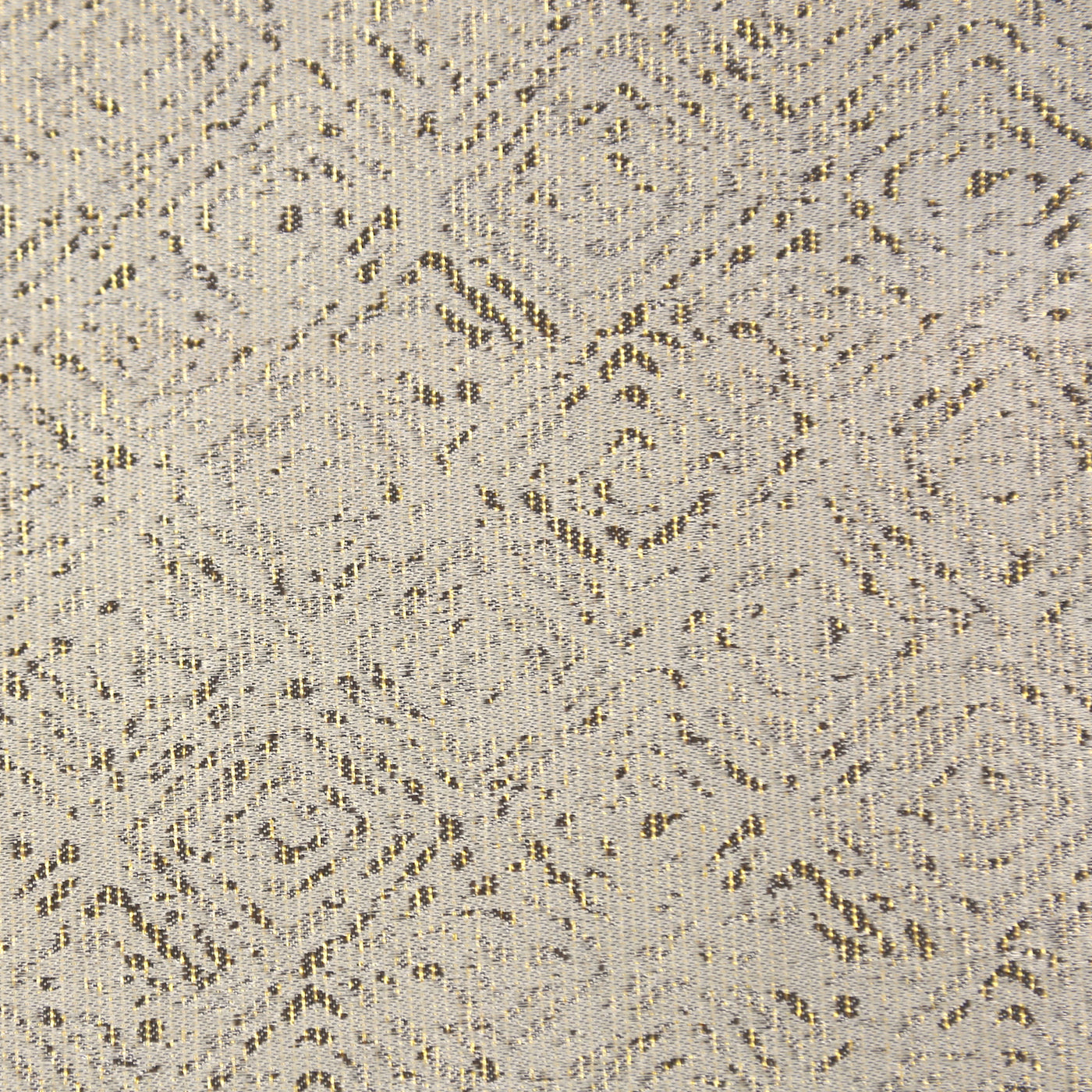 Close-up of Ann Gish Imprint duvet fabric in ivory with woven diamond geometric pattern.