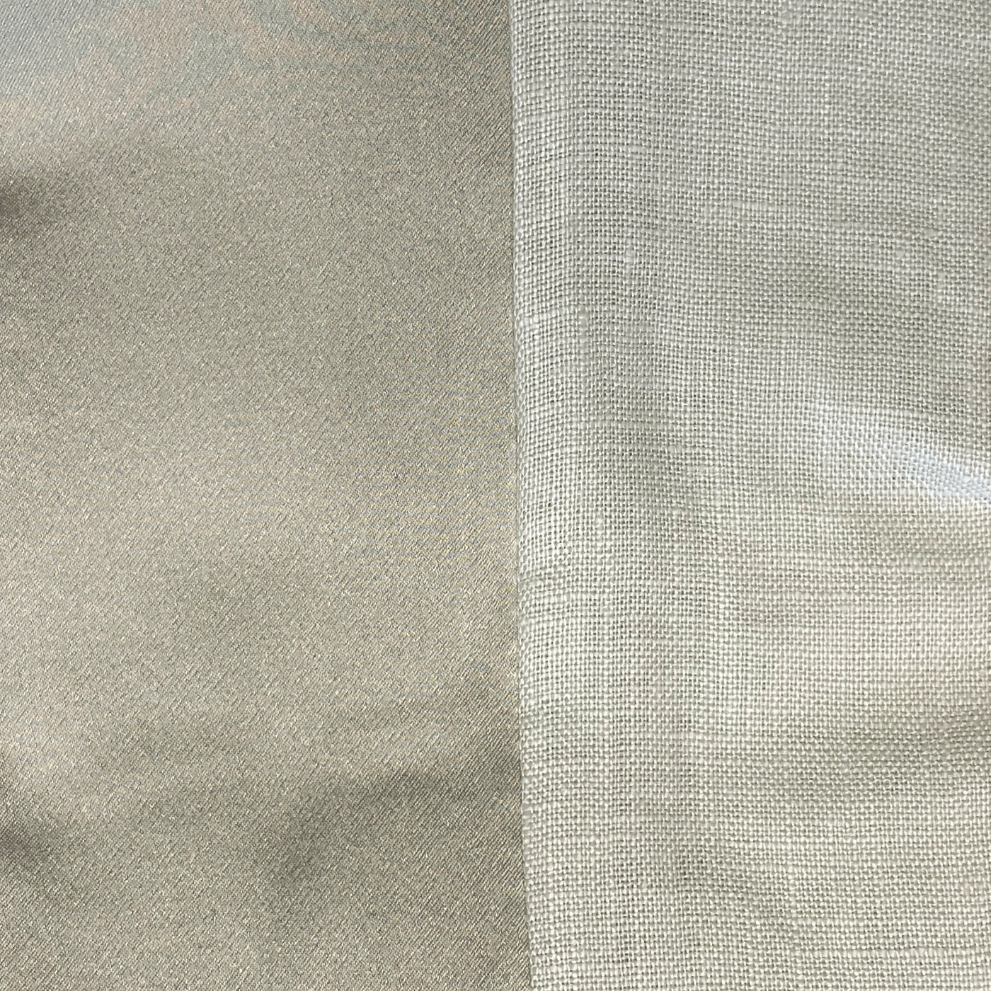 Close-up of two contrasting fabric textures in silver-grey: smooth satin and open linen weave.
