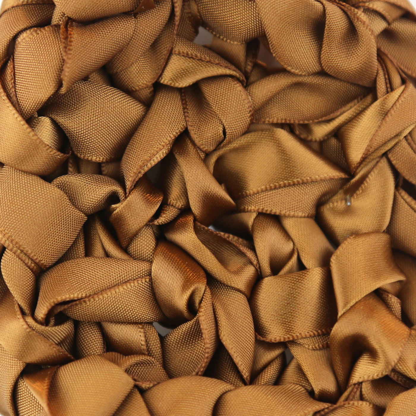 Close-up of Ann Gish Ribbon Knit Pillow in caramel, showing ruffled satin ribbon texture detail.