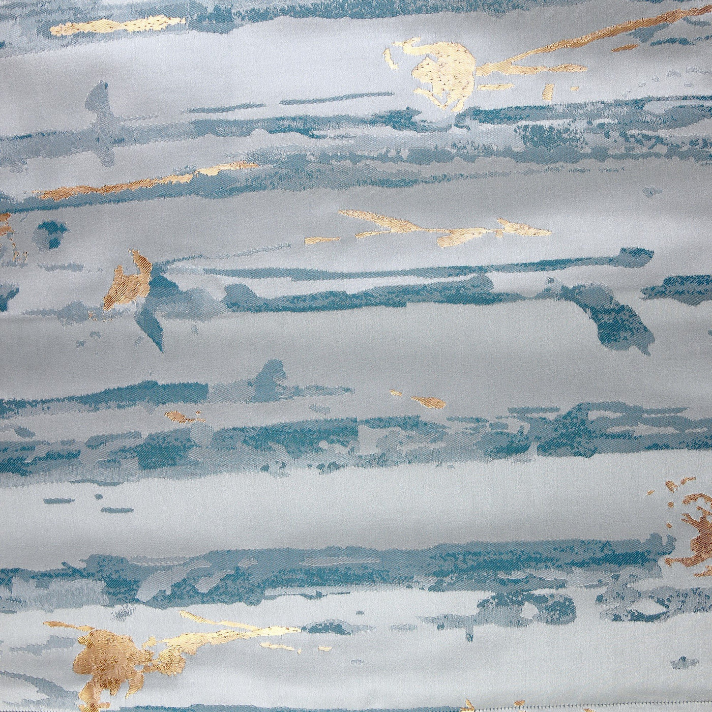 Close-up of Ann Gish Serenity curtain fabric in slate blue with teal brushstroke and gold foil detail.