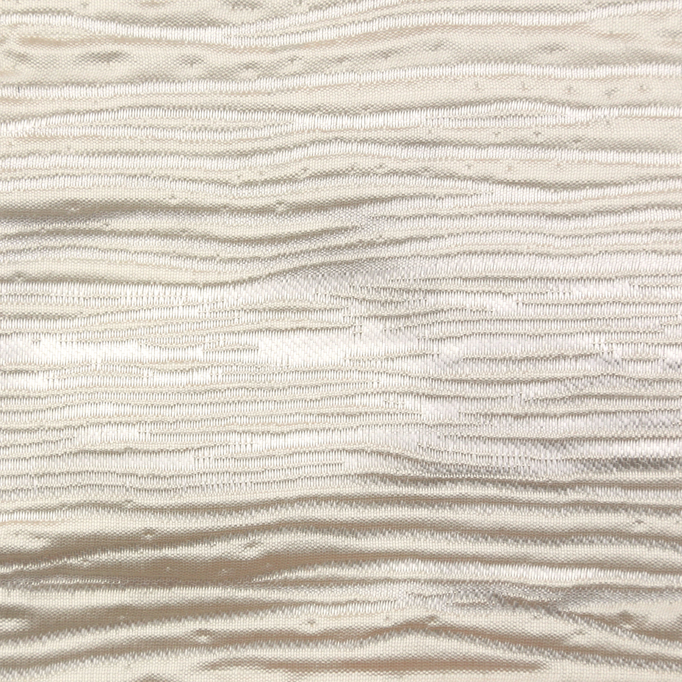 Close-up of Ann Gish Shoreline duvet's ivory wave-textured jacquard weave detail.
