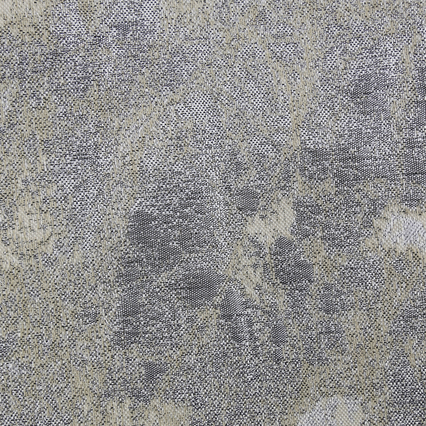 Close-up of Ann Gish Terrazzo curtain panel in silver-grey woven jacquard texture.