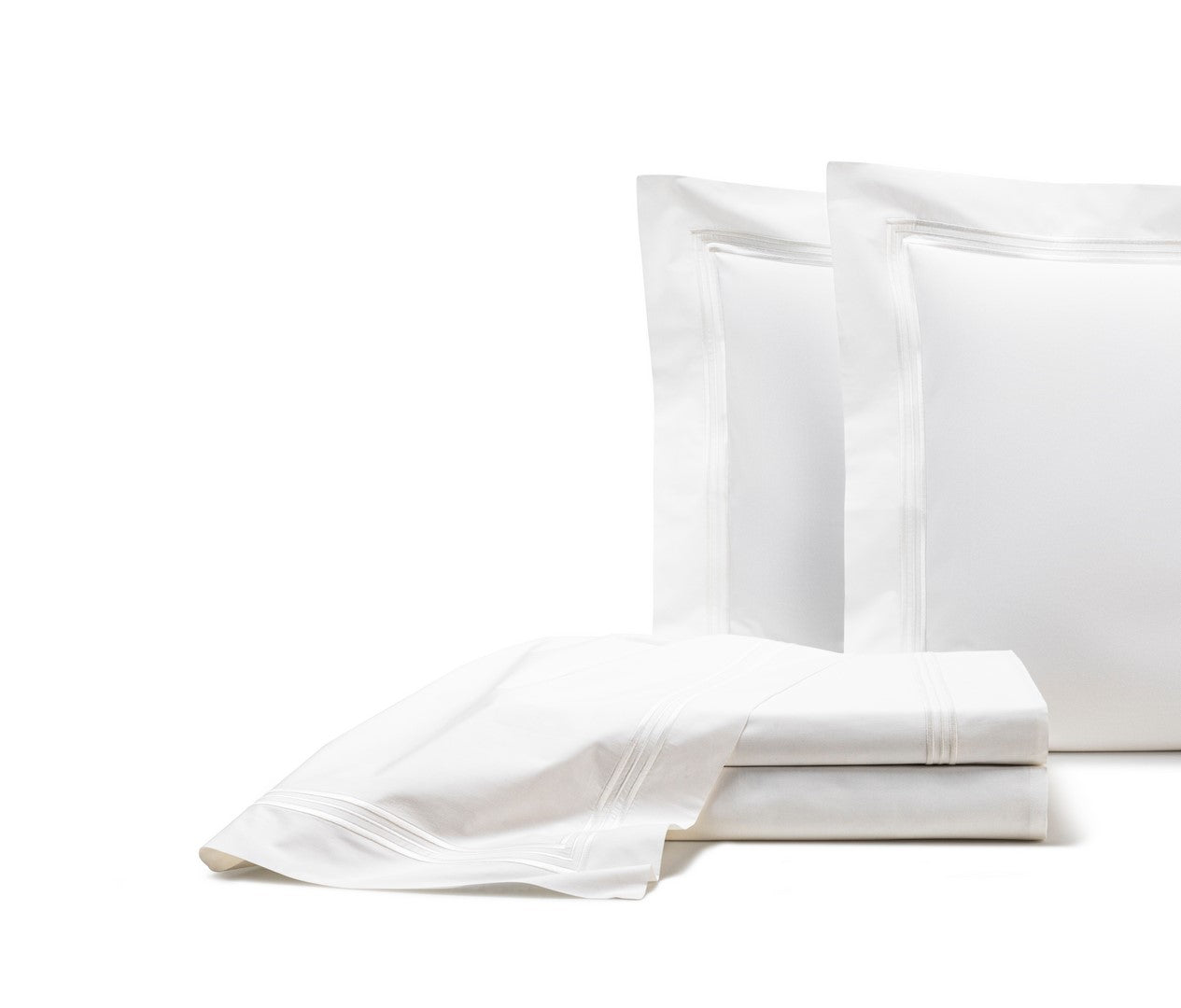 The Frette Triplo Bourdon Sheet Set features luxurious white cotton poplin linens, including two pillowcases, a folded flat sheet, and a folded fitted sheet, all displayed on a plain white background.