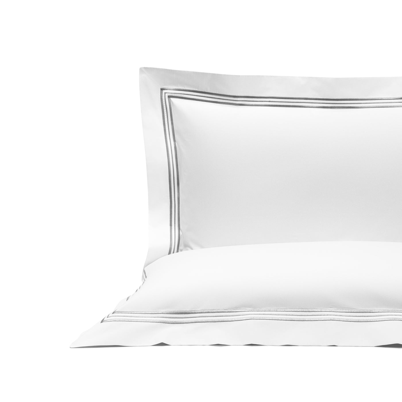 The Triplo Bourdon Pillow Sham by Frette is crafted from cotton poplin in white, showcasing a double-line grey border, and is presented against a plain white background.