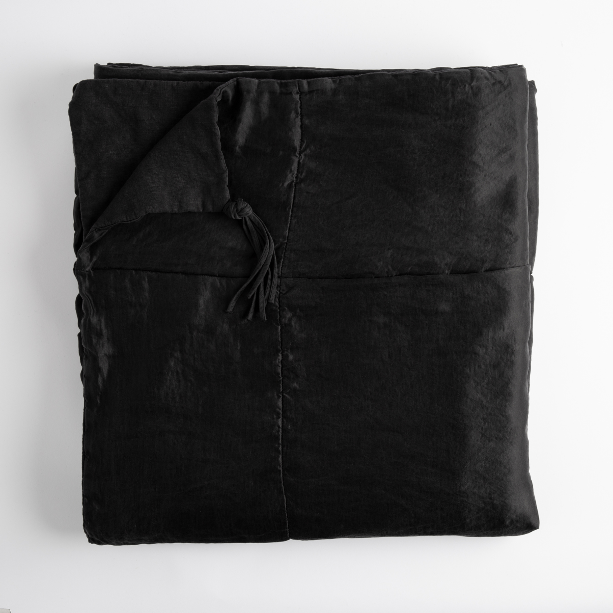 Bella Notte Taline blanket in Corvino, folded flat showing tie closures and velvet sheen.