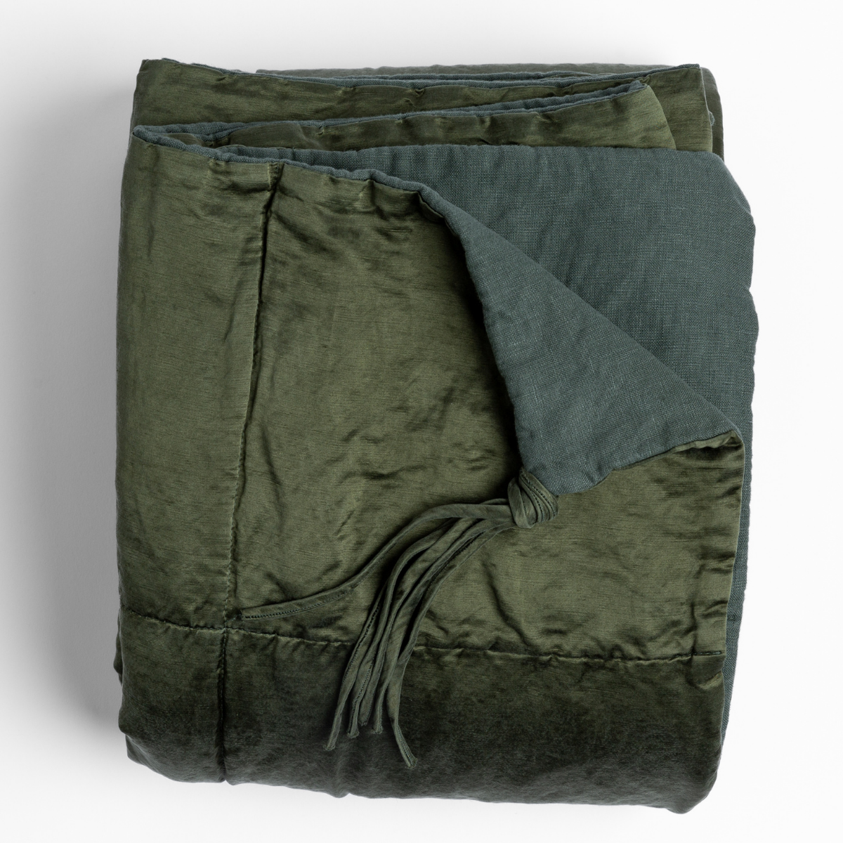 Bella Notte Taline blanket in Juniper, folded to show velvet and linen reverse sides.