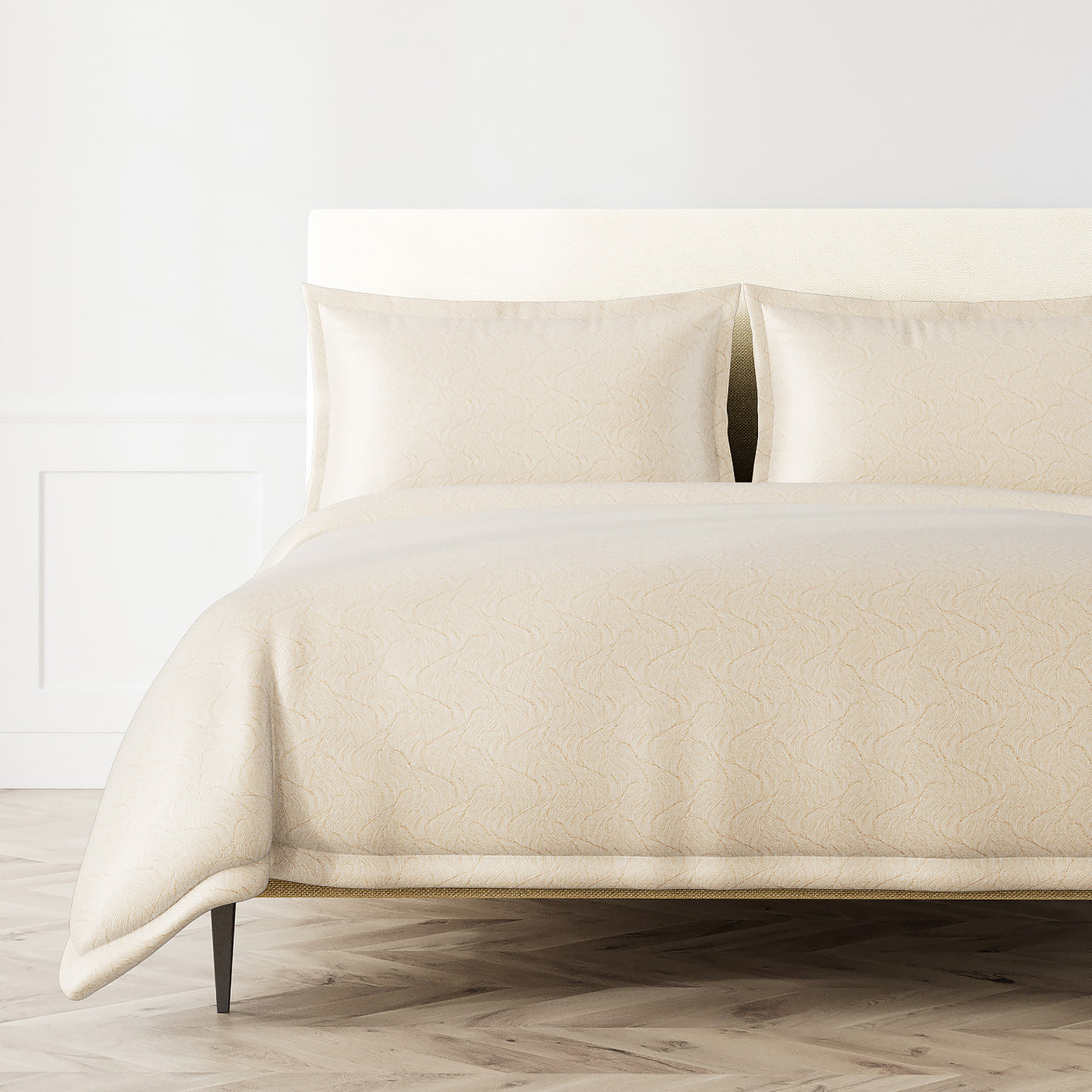 Ivory duvet set with tonal scallop jacquard pattern, styled on a bed with matching shams.
