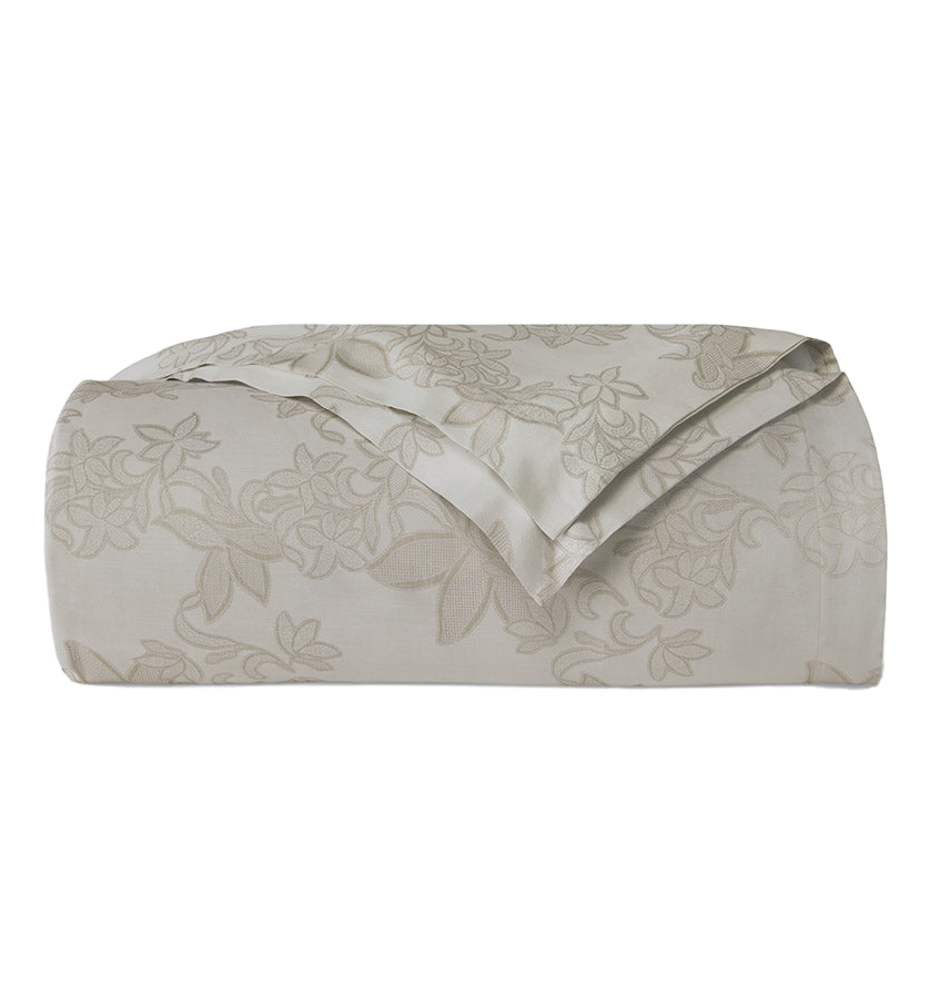 Sferra Tivoli duvet cover in champagne with tone-on-tone floral jacquard, neatly folded.