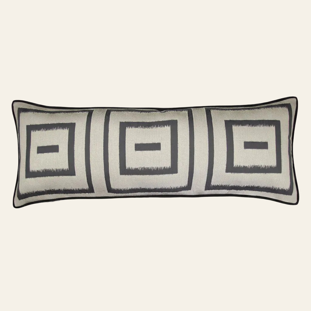 Ann Gish Unmazed lumbar pillow in ivory with charcoal geometric square ikat pattern.