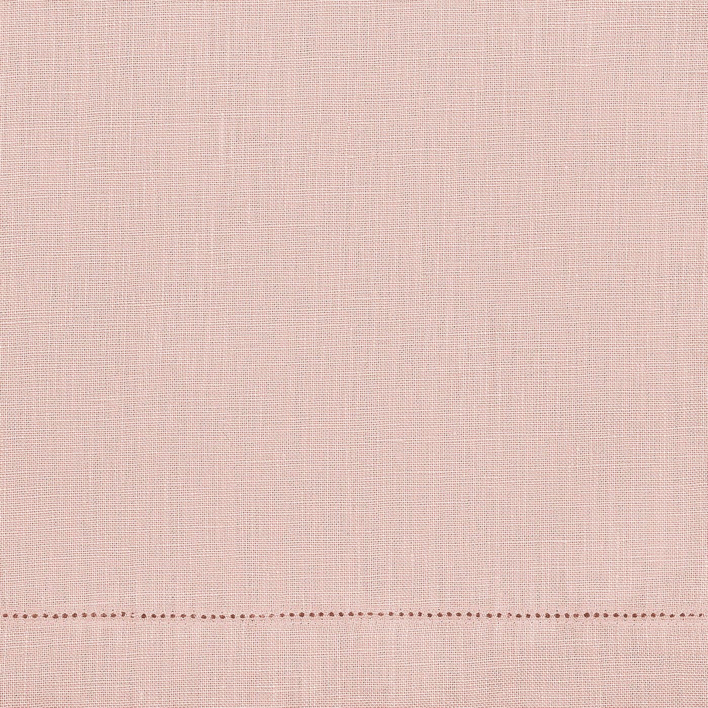 The Valentina Hemstitch Guest Towel by Matouk features light pink sumptuous linen with a visible weave and a horizontal hemstitch border, adding elegance to any luxurious tabletop collection.