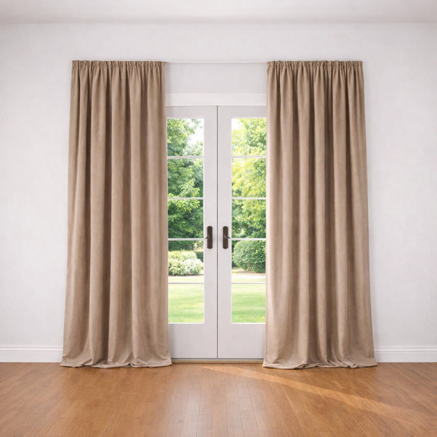 Ann Gish Velvet curtain panels in sand, pencil pleat heading, floor-length drape beside French doors.
