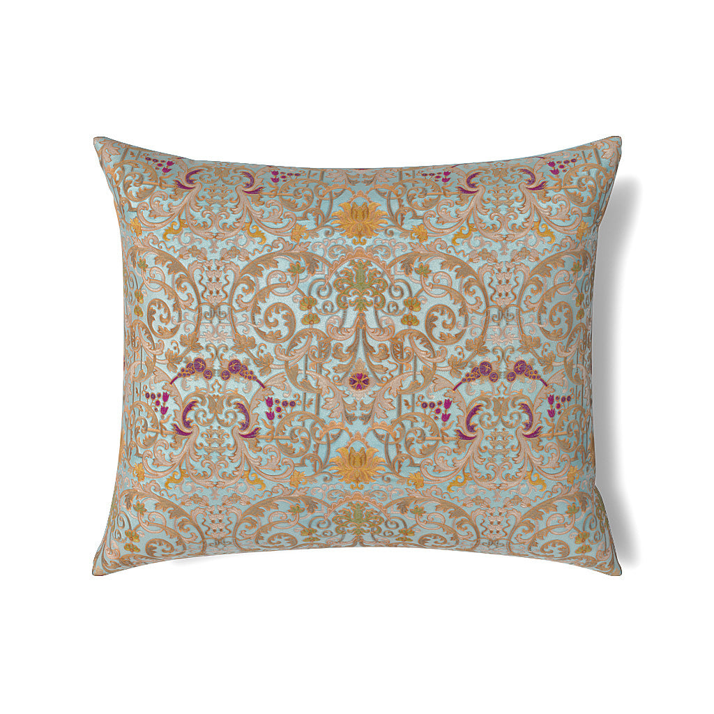 Ann Gish Venezia pillow with ornate gold and aqua scrollwork embroidery on ivory ground.