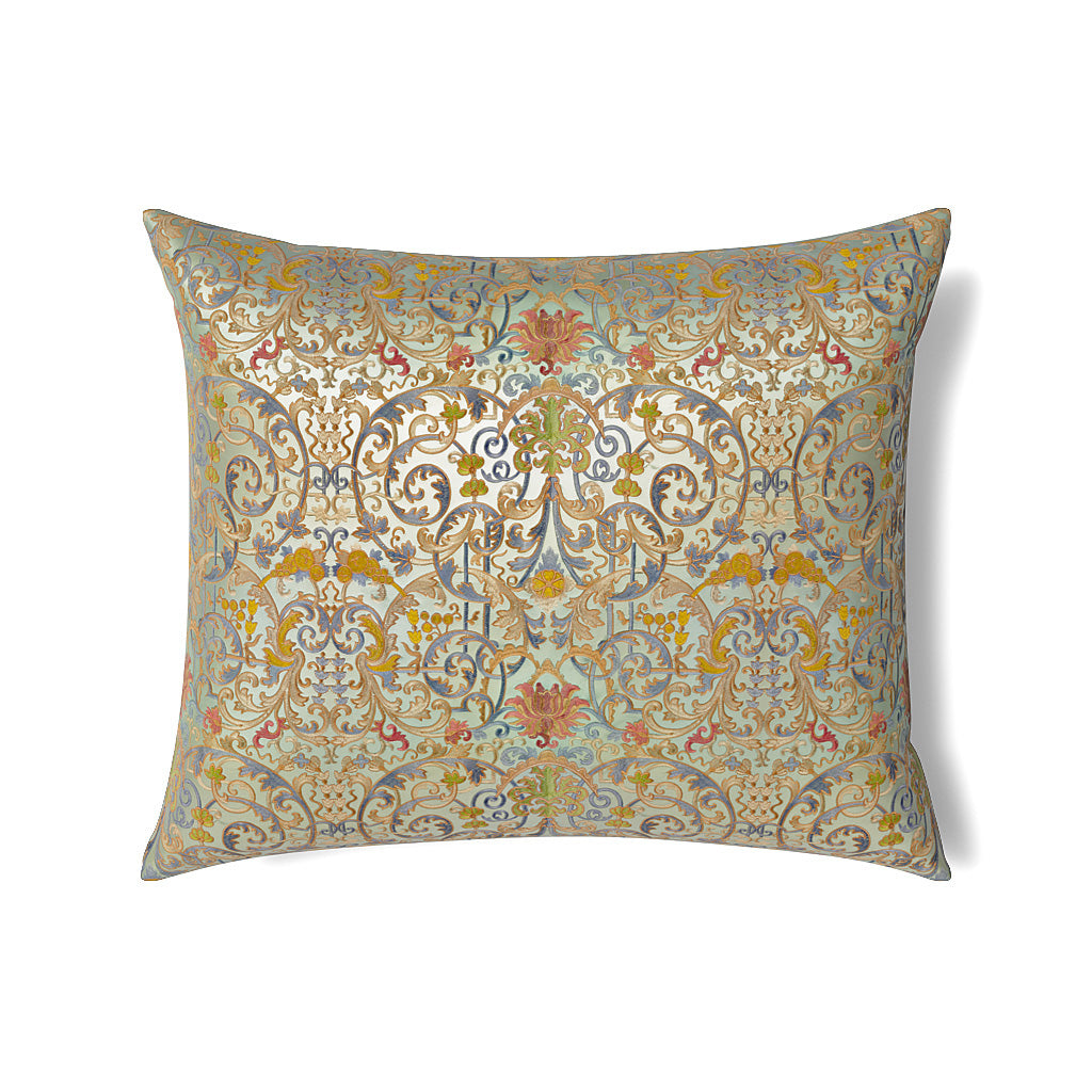 Close-up of Ann Gish Venezia pillow's ornate multicolor scrollwork pattern on sage ground.