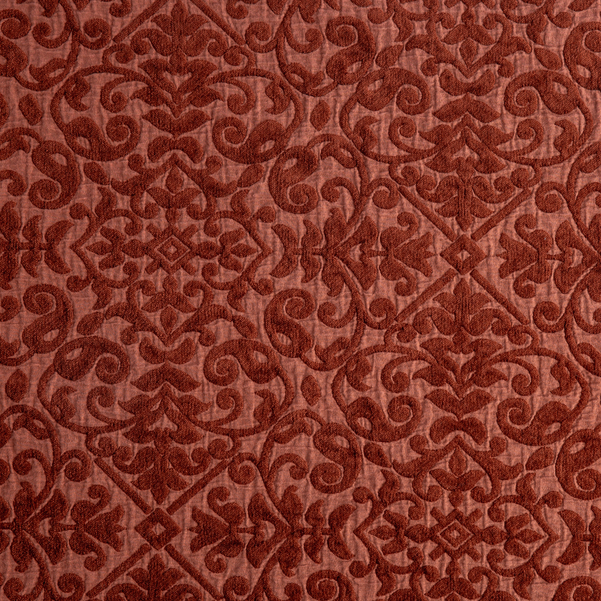 Close-up of Bella Notte Vienna sham in Autumn, showing tonal scrollwork embroidery on textured fabric.