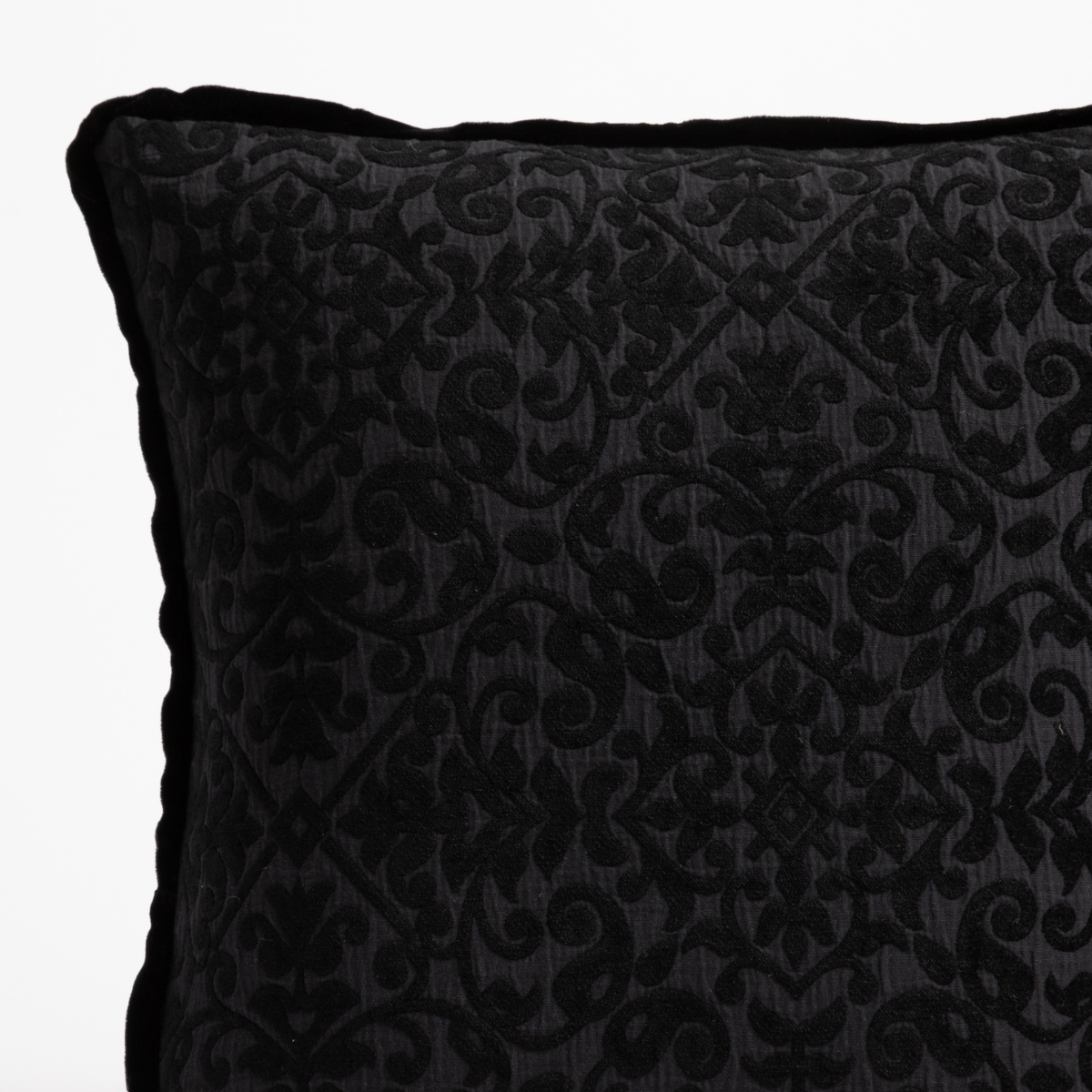 Close-up of Bella Notte Vienna sham corner in Corvino, showing tonal damask embroidery on velvet.