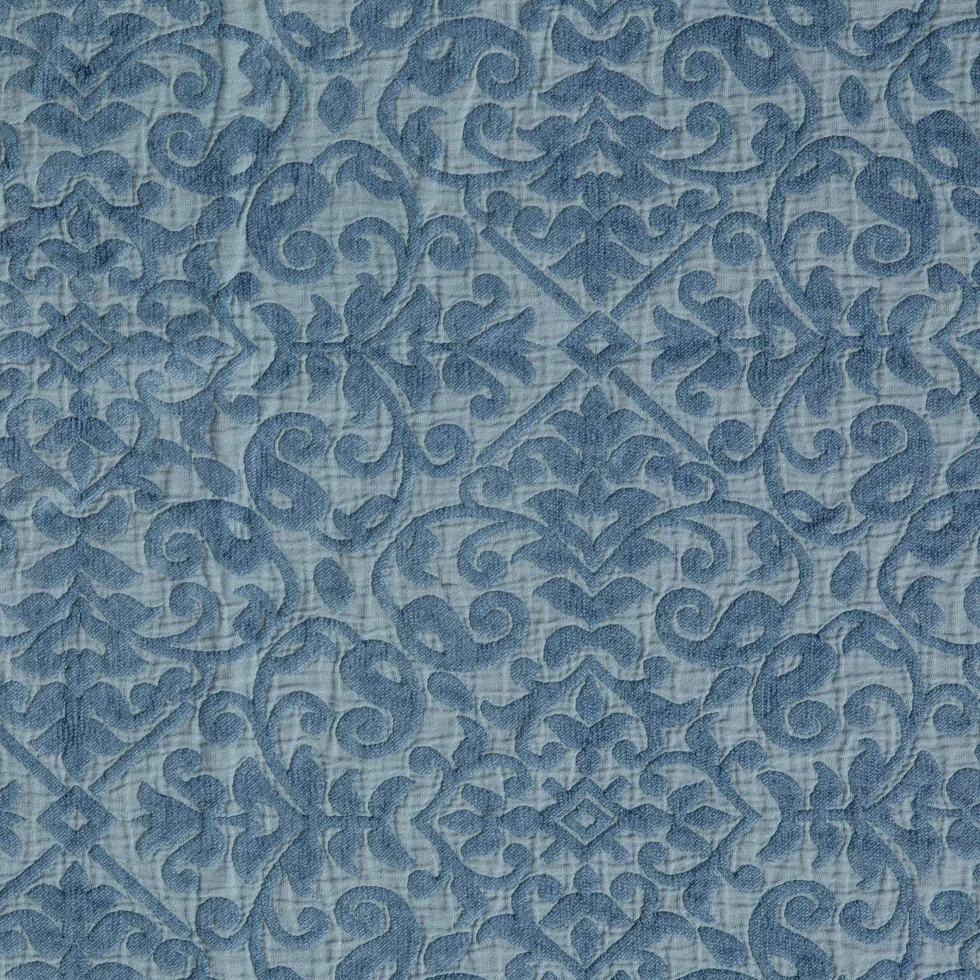 Close-up of Bella Notte Vienna sham in Tahoe Blue, showing quilted damask scroll pattern.