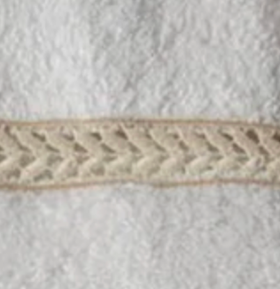 Close-up of ivory chevron lace trim on Home Treasures Wreath hand towel.