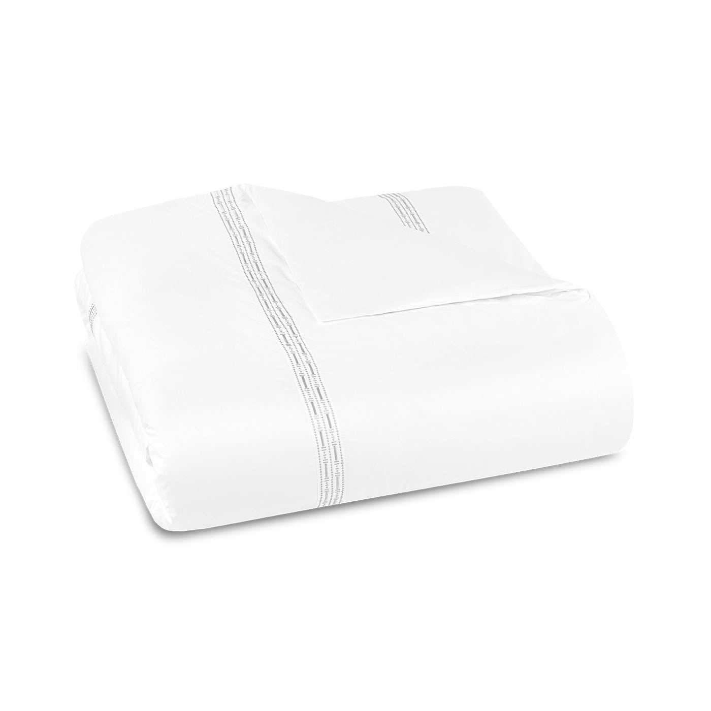 The Memoria Duvet Cover, made in Portugal, is neatly folded and displays subtle parallel gray embroidery near the edges on a plain white background.