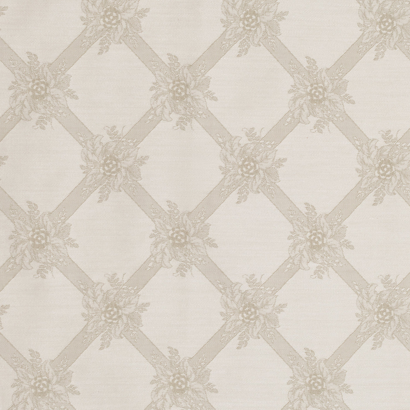 Close-up of Home Treasures Alexandra fabric in ivory with tone-on-tone floral trellis weave.