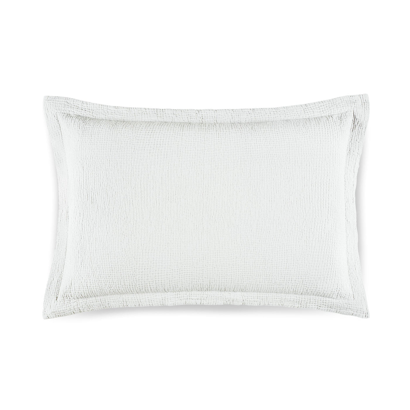 Close-up of Areia sham in white with subtle textured weave and flanged border detail.