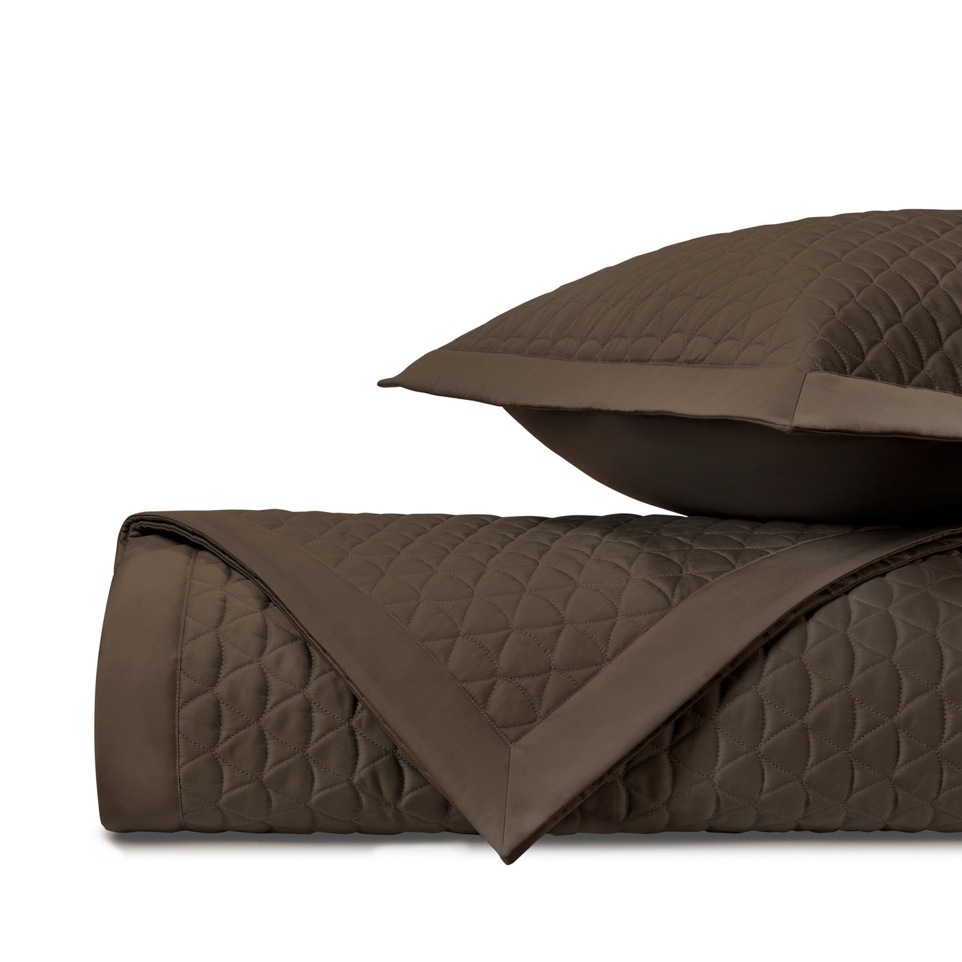 Close-up of quilted diamond stitching on Home Treasures Anastasia coverlet in chocolate.