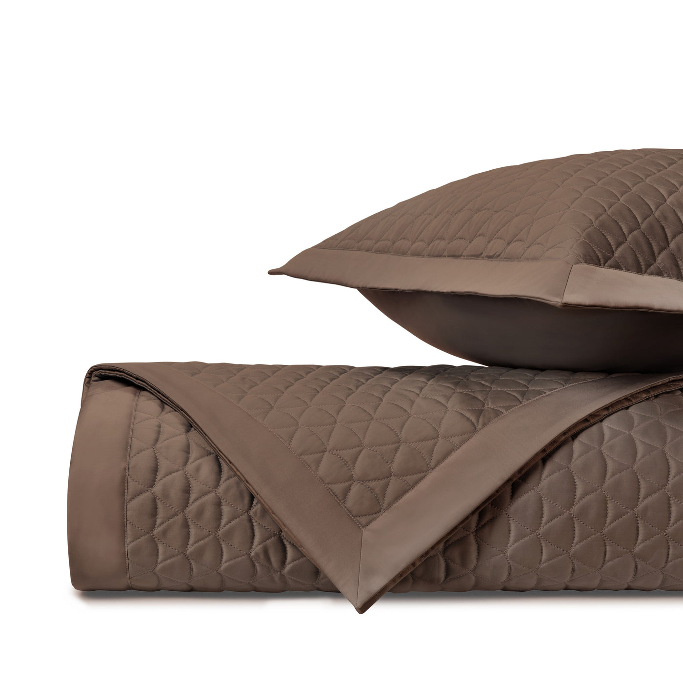 Close-up of Anastasia quilted coverlet's diamond stitching pattern in mink sateen.