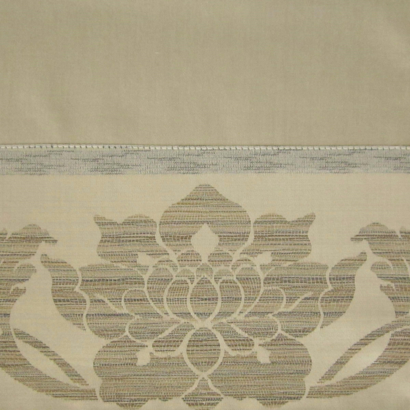 Close-up of Home Treasures Anastasia champagne damask floral border with woven texture detail.