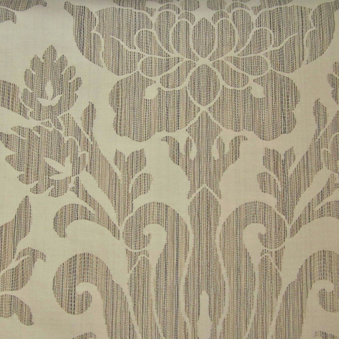 Close-up of Anastasia sham's woven damask floral pattern in champagne and taupe.