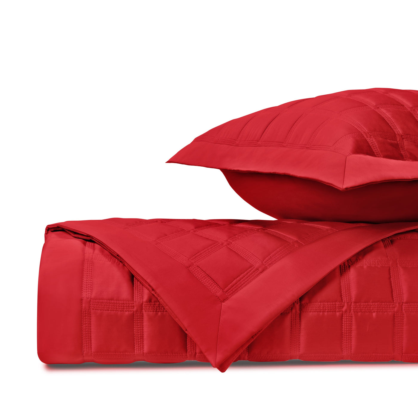 Close-up of Athens quilted satin coverlet and sham in crimson red.