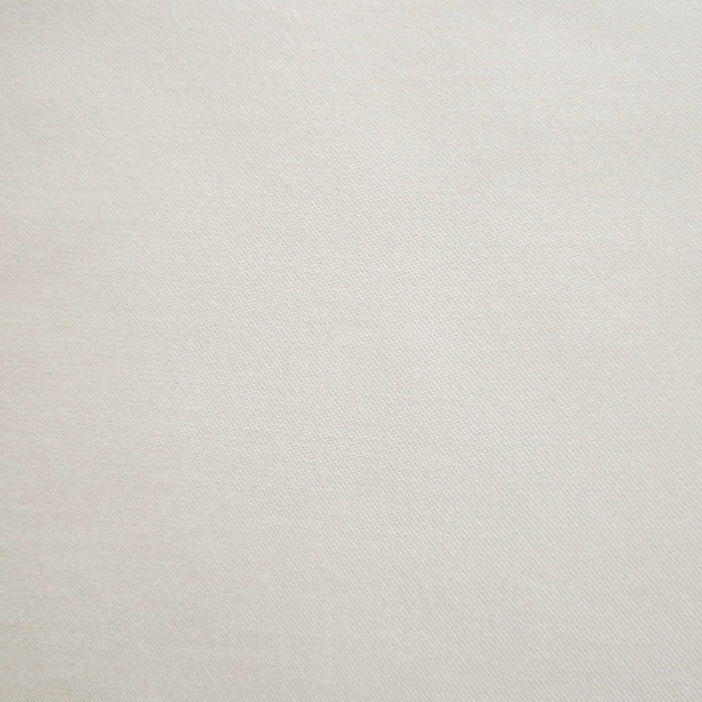 Close-up of ivory Home Treasures Athens fabric showing fine woven texture.