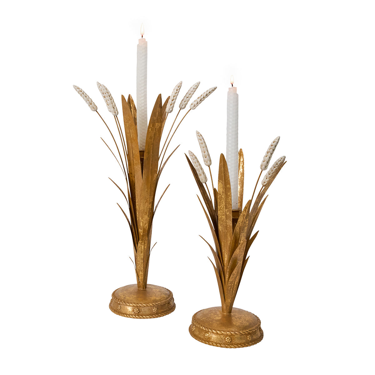 Two Juliska Forest Walk gold wheat candlestick holders in different heights with white tapers