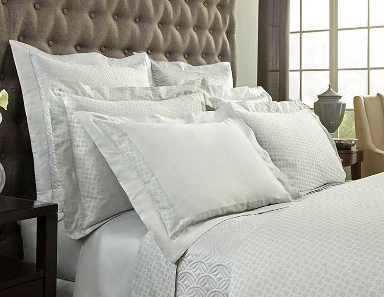 Close-up of Home Treasures Duomo yardage in ivory with geometric woven pattern.