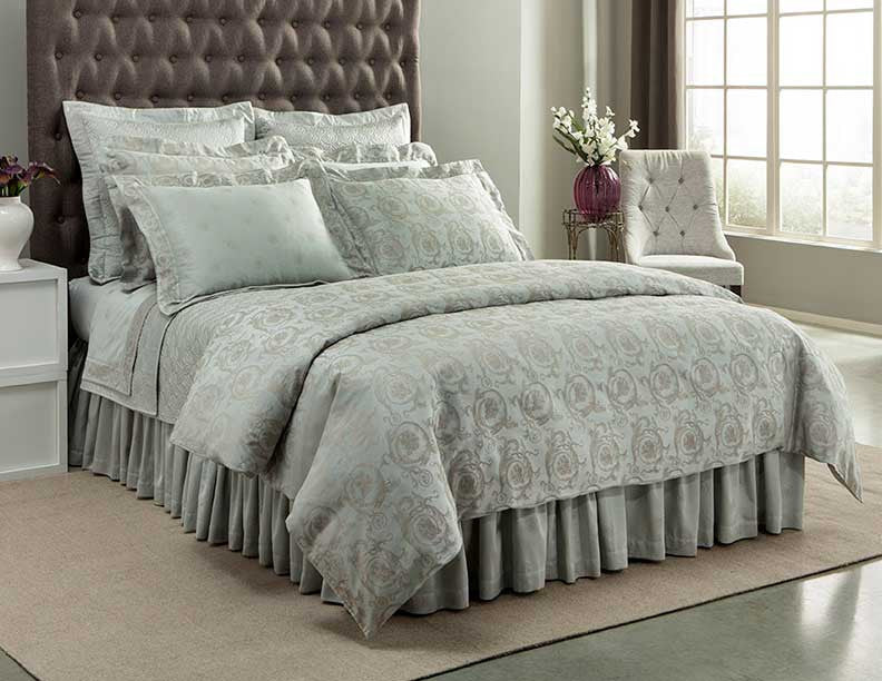 Sage green damask bedding set with medallion jacquard pattern, styled on a king bed.