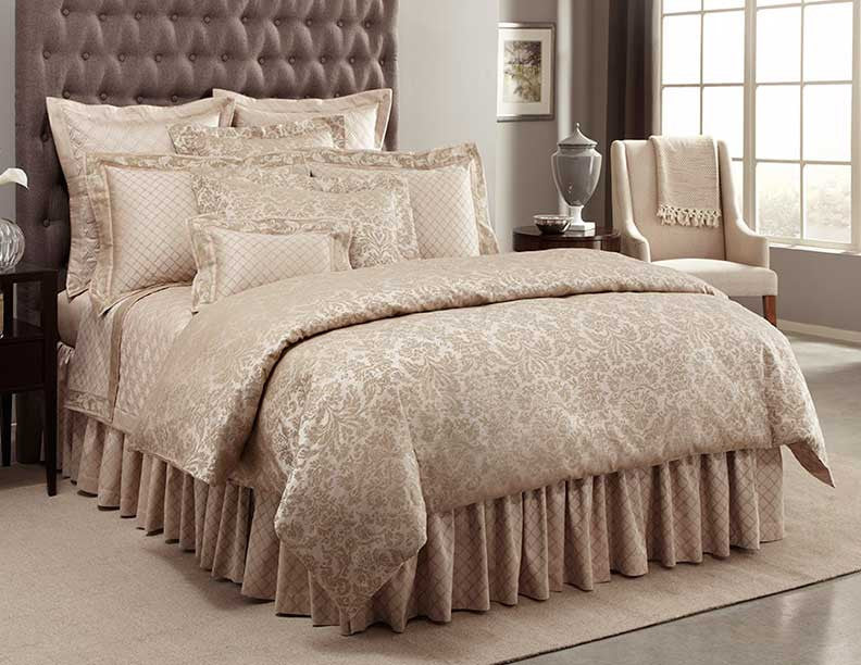 Home Treasures Renaissance champagne damask jacquard pattern close-up on bedding ensemble.