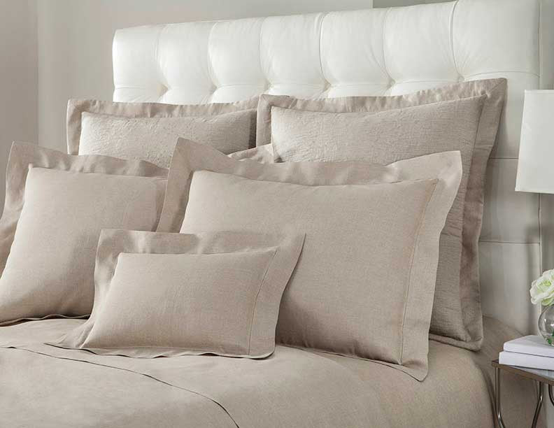 Close-up of Home Treasures Provenza linen bedding in natural latte tones.