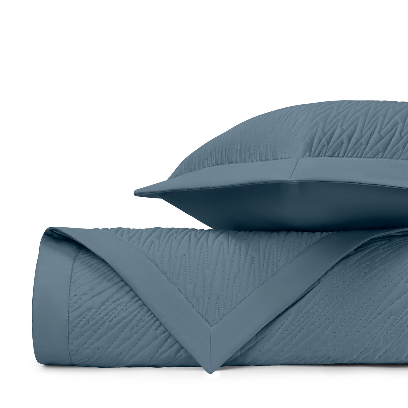 Close-up of Home Treasures Blaze quilted texture in slate blue.