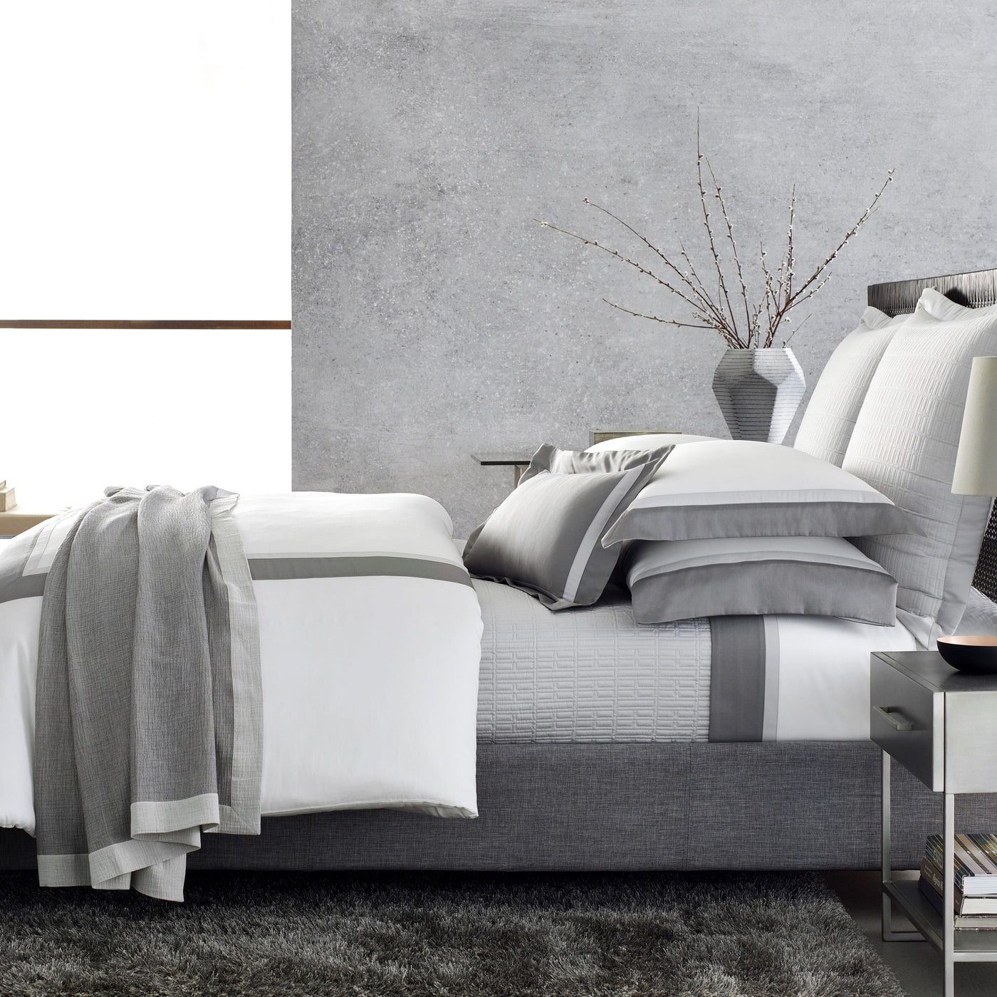 Home Treasures Borders bedding in white and dove grey with contrast border detailing.