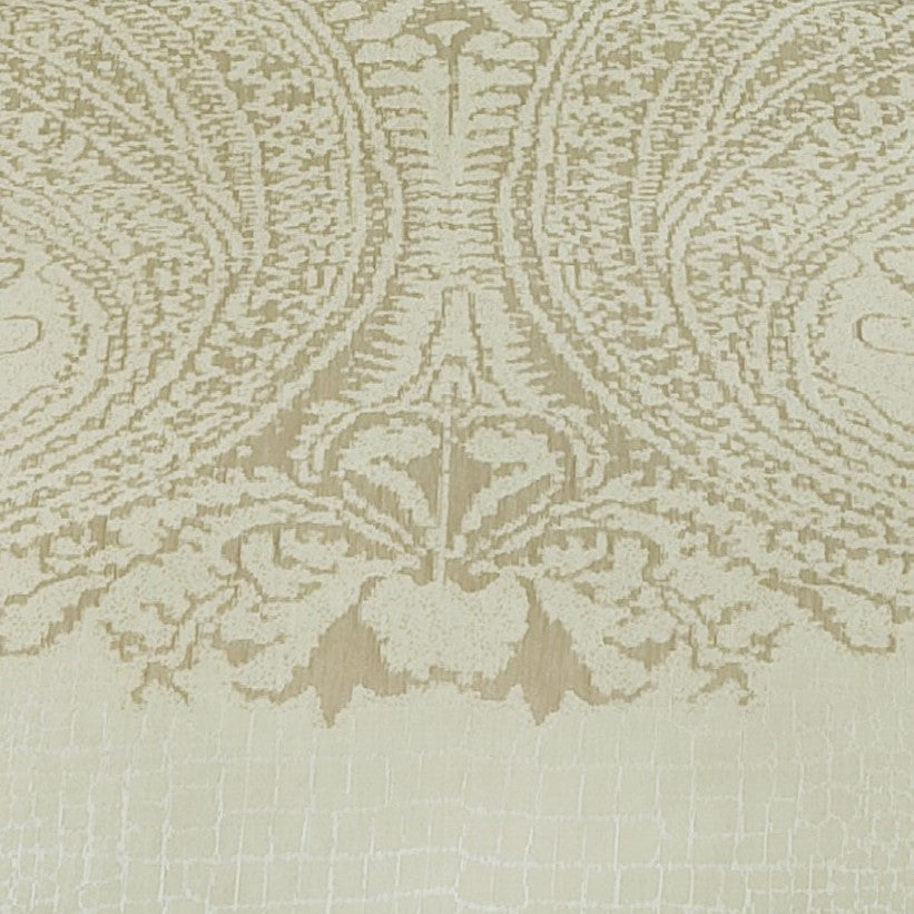 Close-up of ivory and champagne jacquard damask medallion border detail on Home Treasures Casablanca linen.